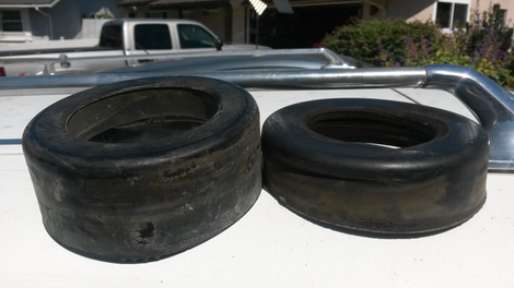A new spring pad (left) was about 3/4" taller than the stock part (right) on its own.